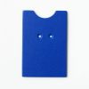 Single, two-hole drilled blue “puzzle”-shaped card