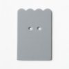 Single, two-hole drilled gray scalloped-shaped card