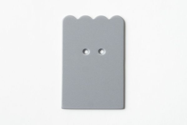 Single, two-hole drilled gray scalloped-shaped card