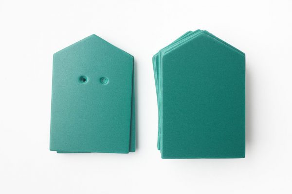 A package of green “house”-shaped cards (10 undrilled and 5 two-hole drilled)