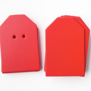 A package of red “barn”-shaped cards (10 undrilled and 5 two-hole drilled)