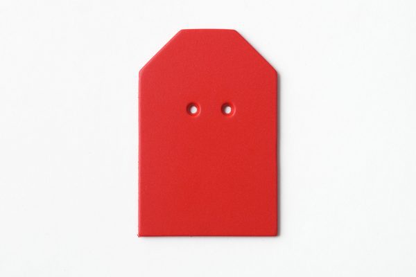 Single, two-hole drilled red “barn”-shaped card