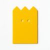 Single, two-hole drilled yellow “crown”-shaped card