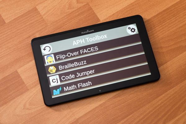 MATT Connect tablet without stand showcasing the APH Toolbox with the following apps – Flip-Over FACES, BrailleBuzz, Code Jumper, and Math Flash.