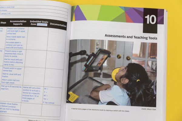 Sensing and Learning opened to Chapter 10 – Assessments and Teaching Tools. There is an image of a young learner turning pages on her electronic book by tapping a switch to her cheek.