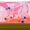 Swirly Mats FVA pink and clear mat with color disks on top of an APH LED Light Box.
