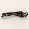 The black PageBlaster power cord wrapped up sitting on a white background.