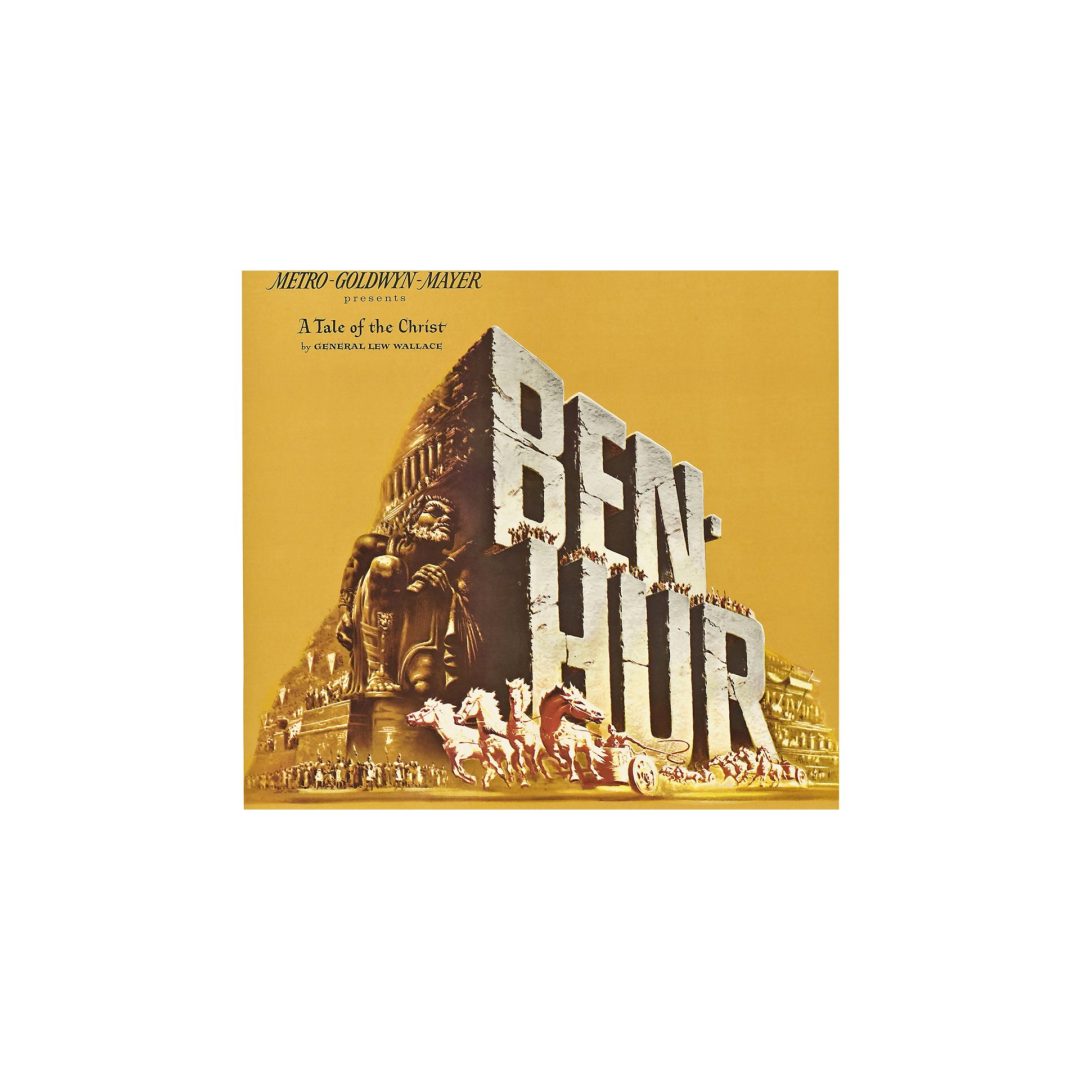 A vintage movie poster for Ben Hur. The name “BEN HUR" is spelled out in letters with a stone-like texture, with a large statue of a man in Roman-like attire crouching beside and slightly behind the letters “B” and “H.” A crowd of people stand on the word “HUR” as a a chariot race happens on the ground below the letters. In the top left hand corner of the image are the words “Metro-Goldwyn-Mayer Presents A Tale of the Christ by General Lew Wallace."