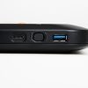 A close-up of the left edge of the Monarch device showing from top to bottom a USB-C port, the power button, and a USB-A port.