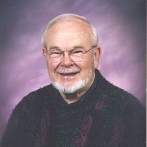 Professional headshot of Neil Kliewer.