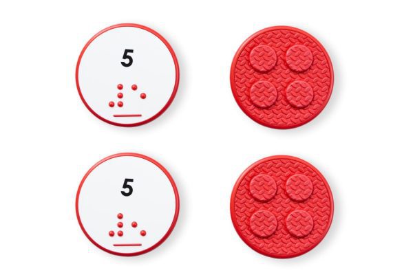 Comparison of two red circle number tiles showing the differences between UEB and Nemeth for the number 5.