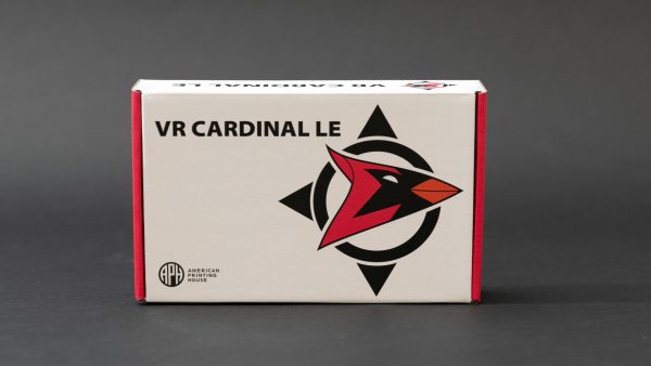 Front view of the VR Cardinal box. Printed on the front is the Cardinal logo, a compass-style graphic with a cardinal illustration with its beak pointing East, and the product name “VR CARDINAL LE.” In the lower left corner is the APH logo.