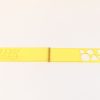 The yellow transparent tactile shape slate laid completely open on a white background. The slate contains circles, triangles, squares, and more in various sizes.