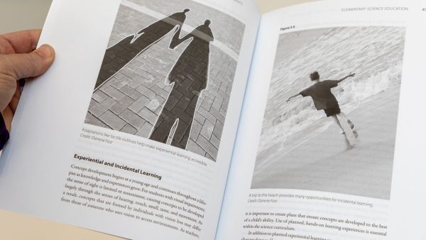 A close up of two pages in Accessible Science depicting a section called "Experiential and Incidental Learning." On the left side is a picture showing shadows of two students that have been outlined with tactile material, and on the right is a photo of a young boy walking barefoot on a beach.