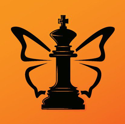 A chess piece is shown in front of two Monarch wings.