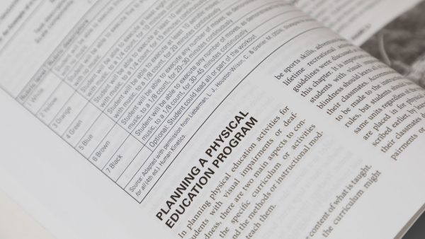 A close up of an open page of PE and Sports. The section is titled "Planning a Physical Education Program."