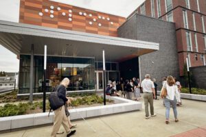 Groups of people walking into The Dot Experience at American Printing House 